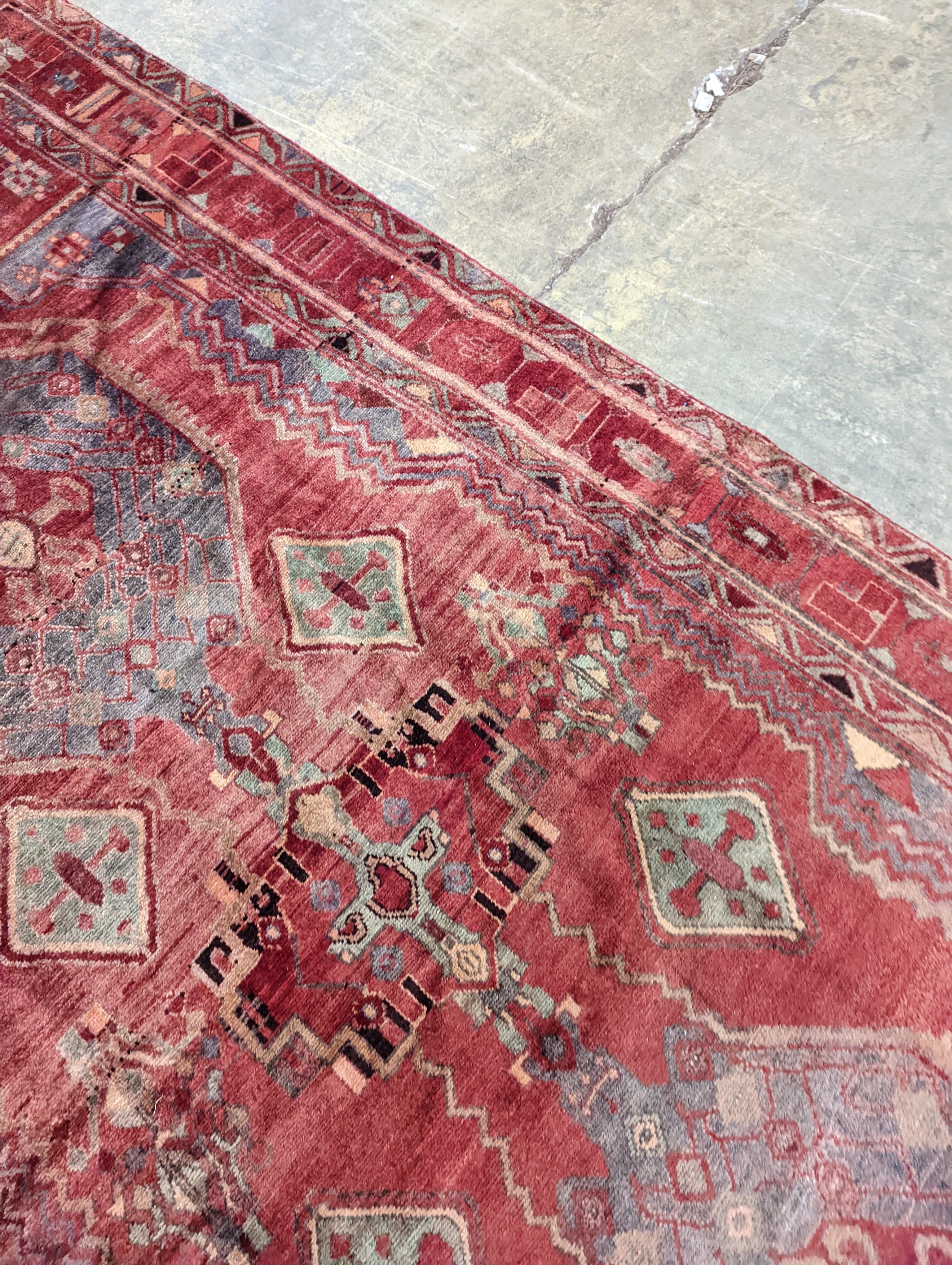 An Ardabil red ground carpet, 322 x 157cm